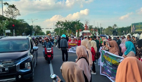 Masyarakat Pekanbaru Gelar Aksi Damai Dukung Pengesahan UU TNI