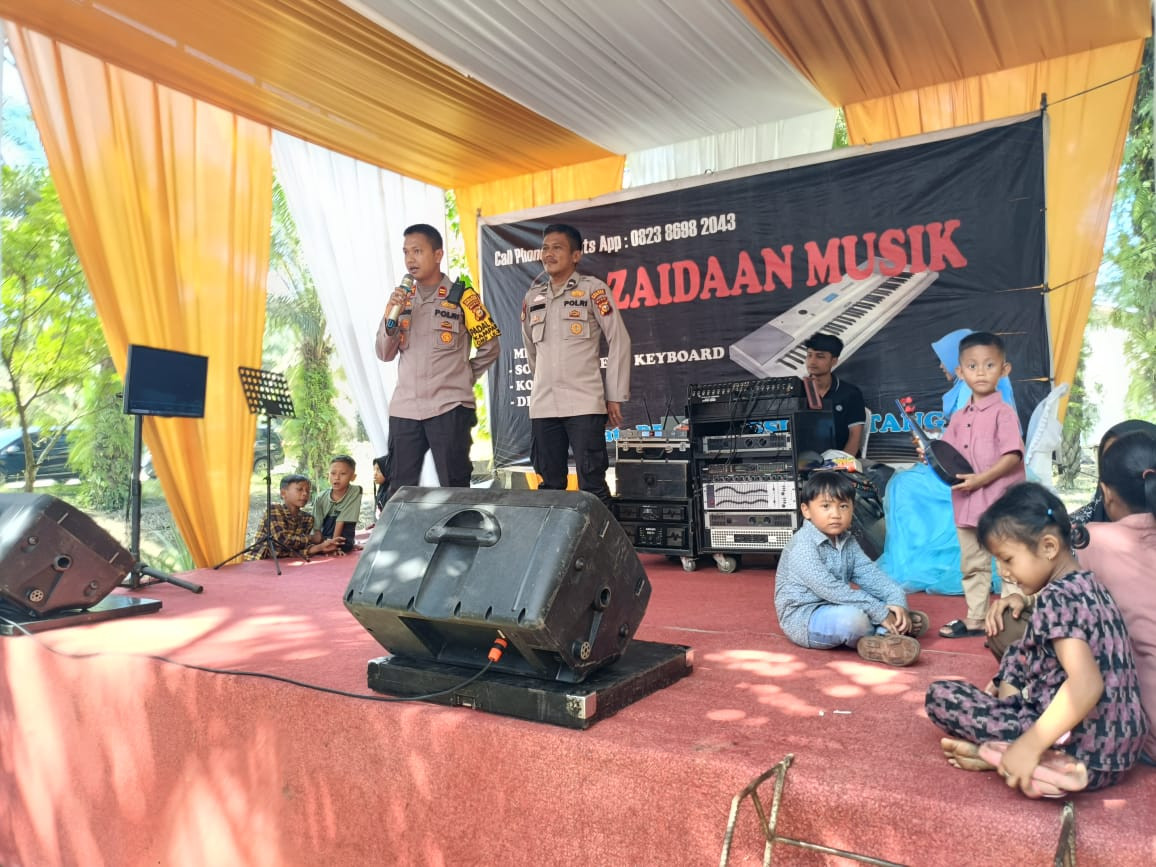 Kapolsek Bonaidarussalam Sampaikan Pesan Cooling System di Acara Hajatan Warga