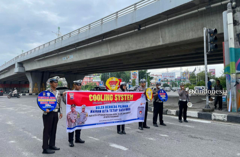 Satlantas Polresta Pekanbaru Gelorakan Pemilukada Damai dan Tertib Berlalu Lintas 
