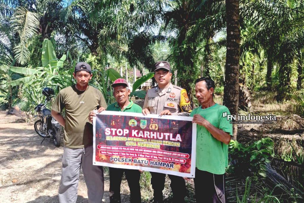 Kapolsek Batu Hampar Giatkan Bhabinkamtibmas Bantaian Hilir Sosialisasi Larangan Membakar Hutan dan Lahan