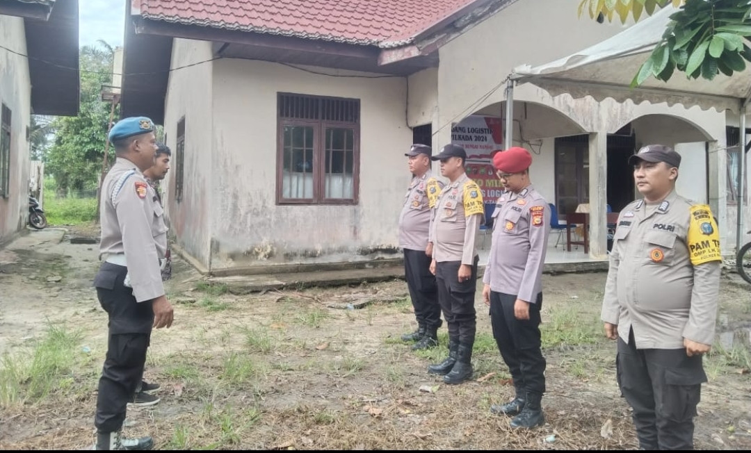 Polsek Sungai Mandau Perketat Pengamanan Gudang Logistik Pilkada 2024 di Kecamatan Sungai Mandau